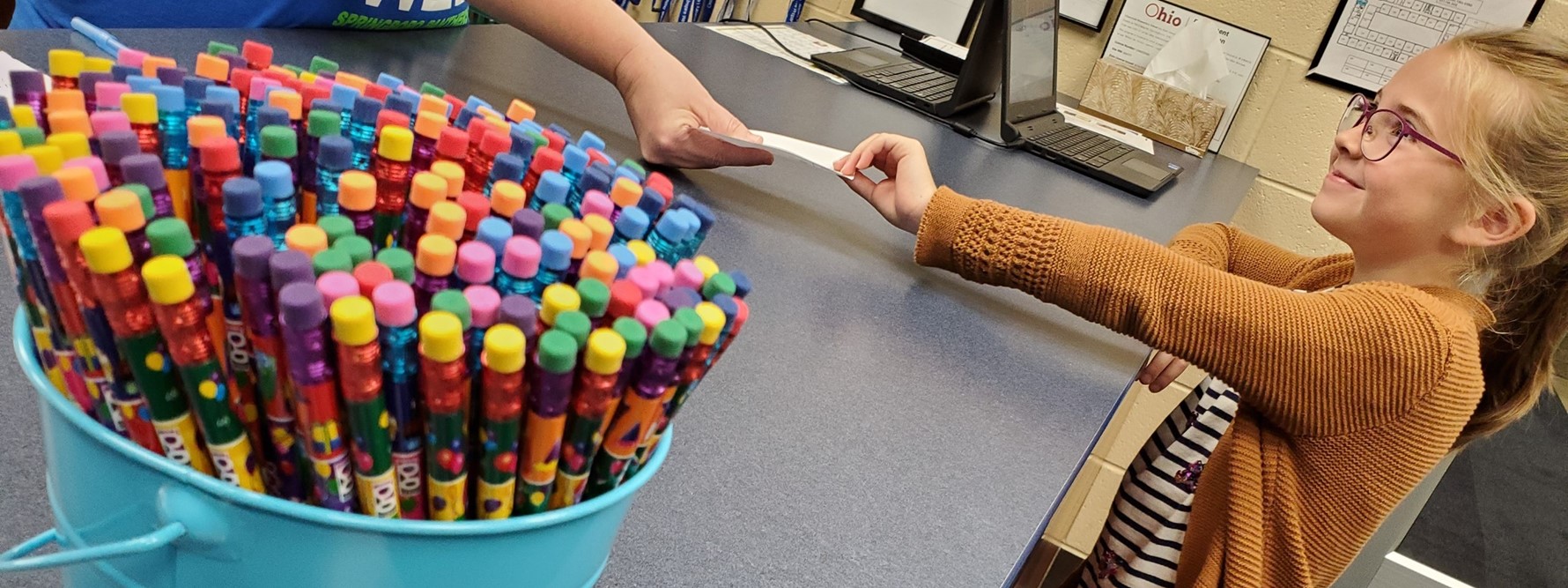 Student bringing a note to the office