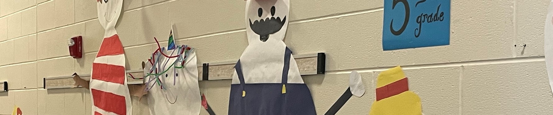 Student made snowmen artwork on the wall